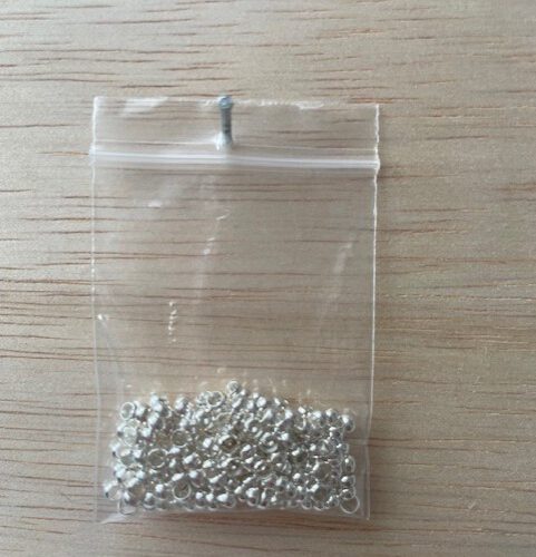 Zilveren Knijpkralen