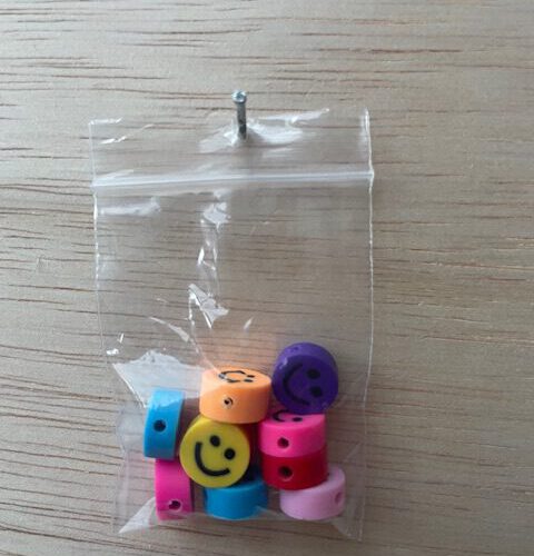 Polymeer Smiley's gekleurd