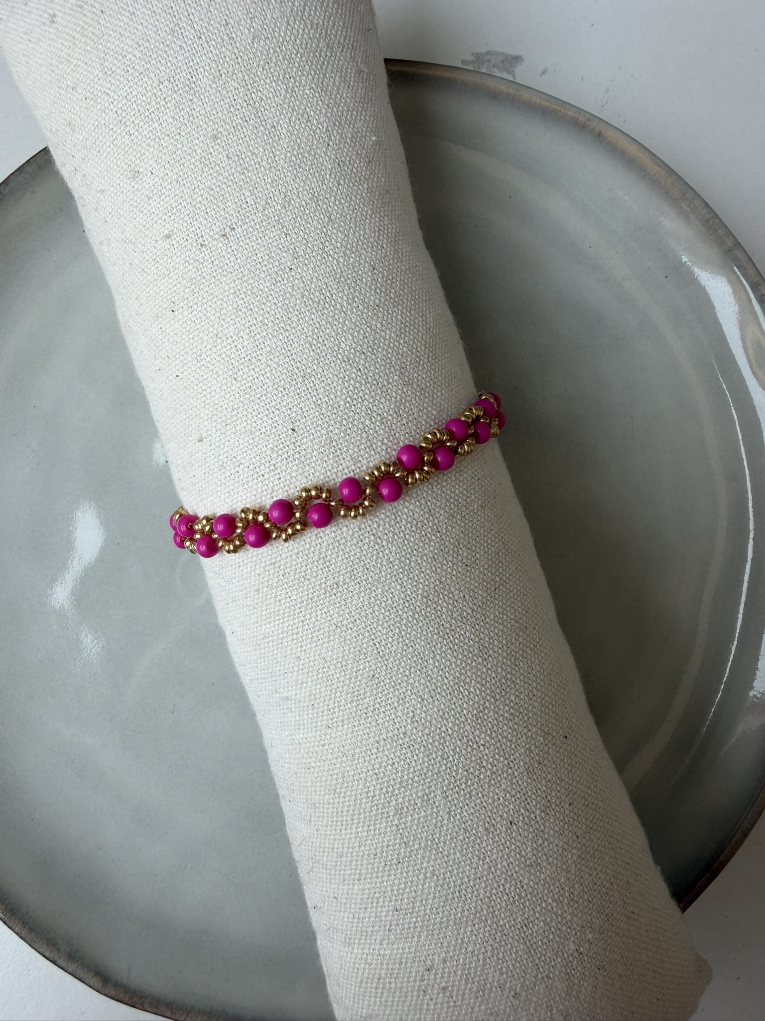 Swirl Armbandje fuchsia/goud