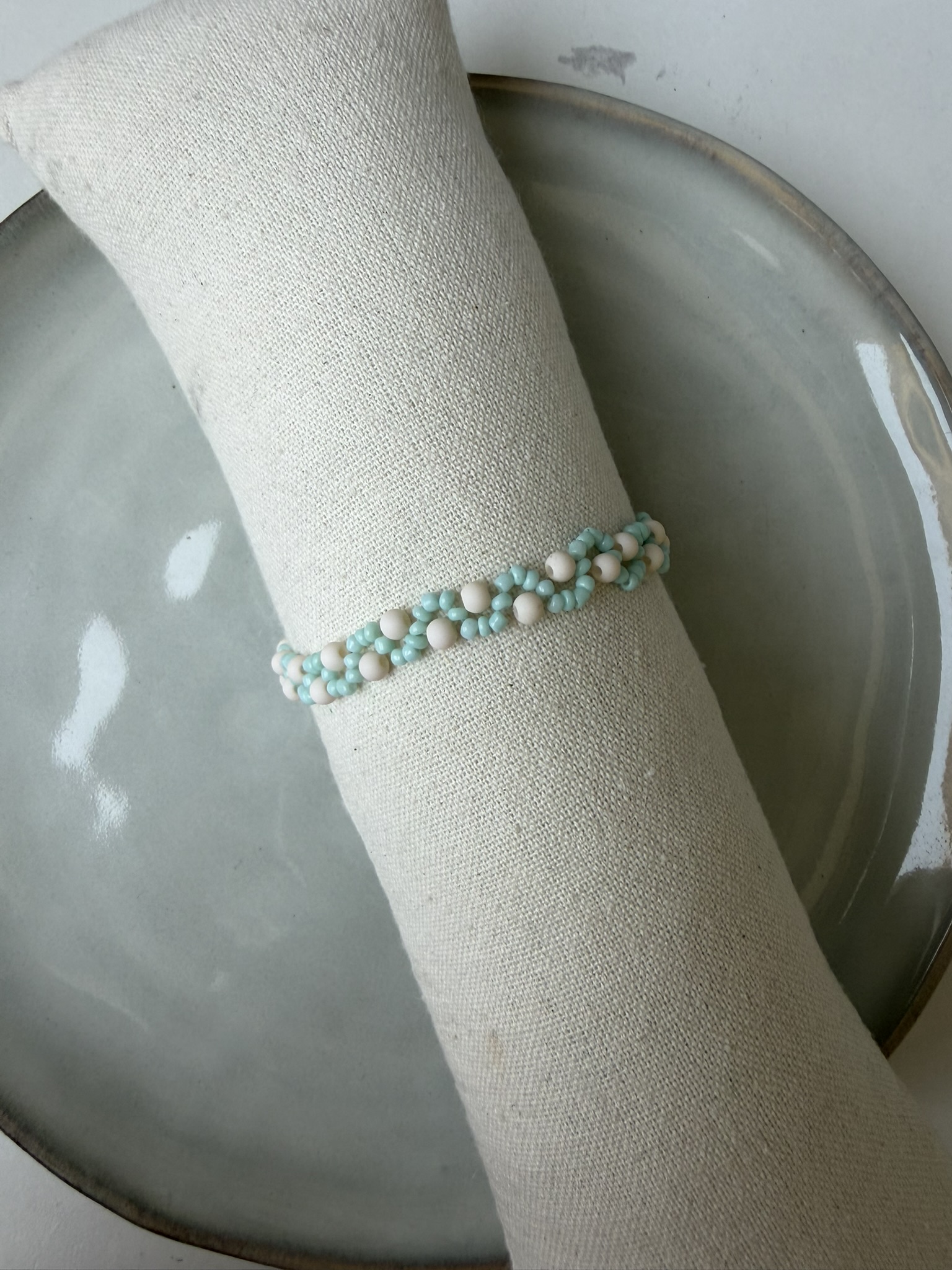 Swirl Armbandje turquoise/beige