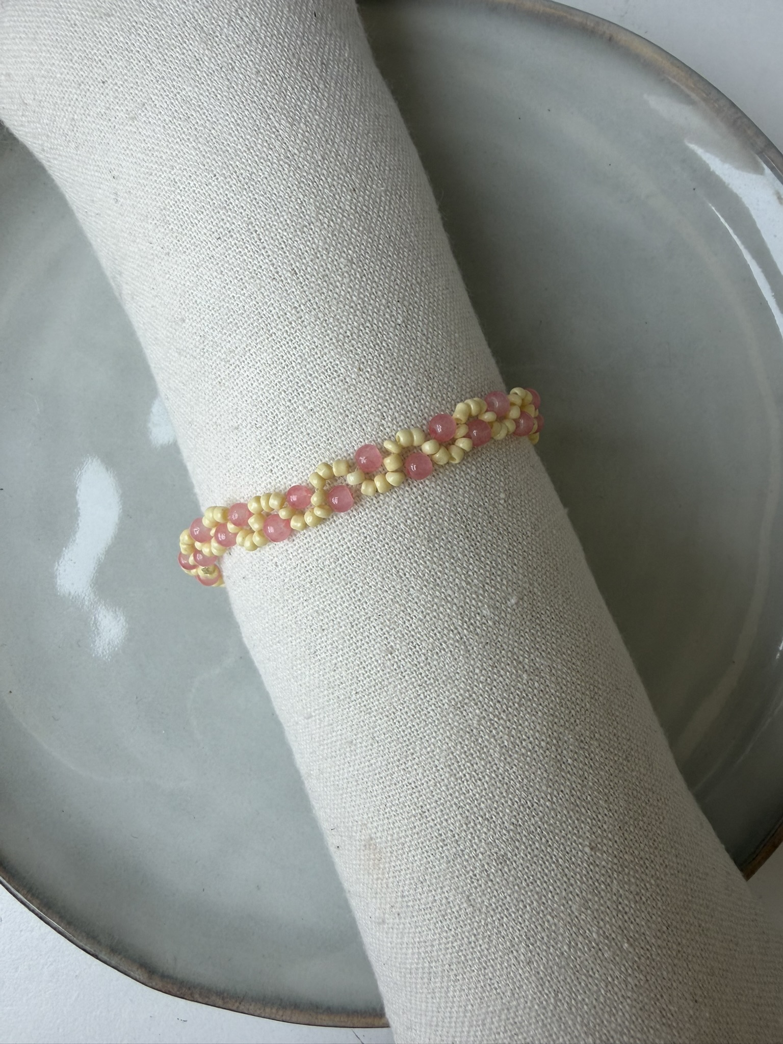 Swirl Armbandje geel/roze